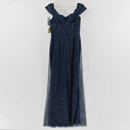 Lynn's Closet Boutique navy sequin floor-length gown with an off-the-shoulder neckline on a hanger.