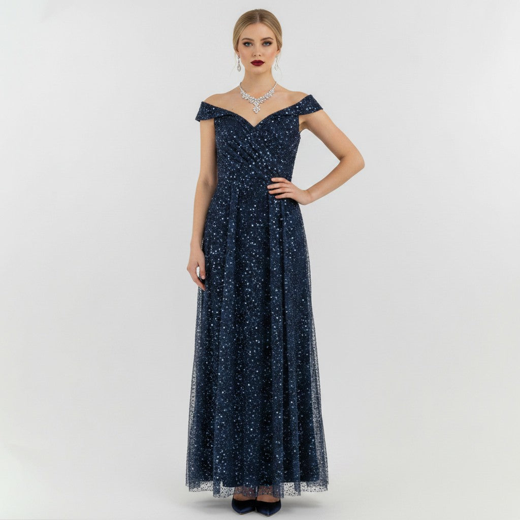 Model wearing a Lynn's Closet Boutique navy off-the-shoulder sequin floor-length evening gown with a sweetheart neck.