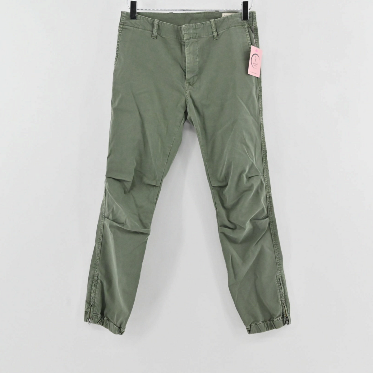 Lynn's Closet Boutique Nili Lotan olive green slim-fit pants with side-zip ankles and back flap pockets.