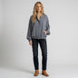 Lynn's Closet Boutique Nouvelle silk gray top with button-front, elastic hem, and side pockets worn by a model.