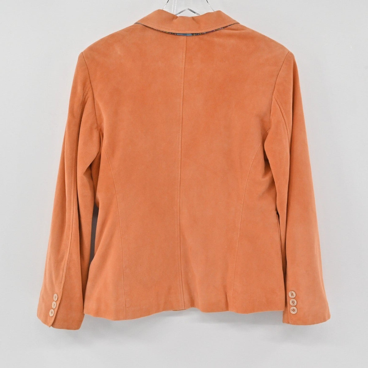 Lynn's Closet Boutique Peter Millar orange suede leather blazer, back view showing tailored fit and buttoned cuffs.