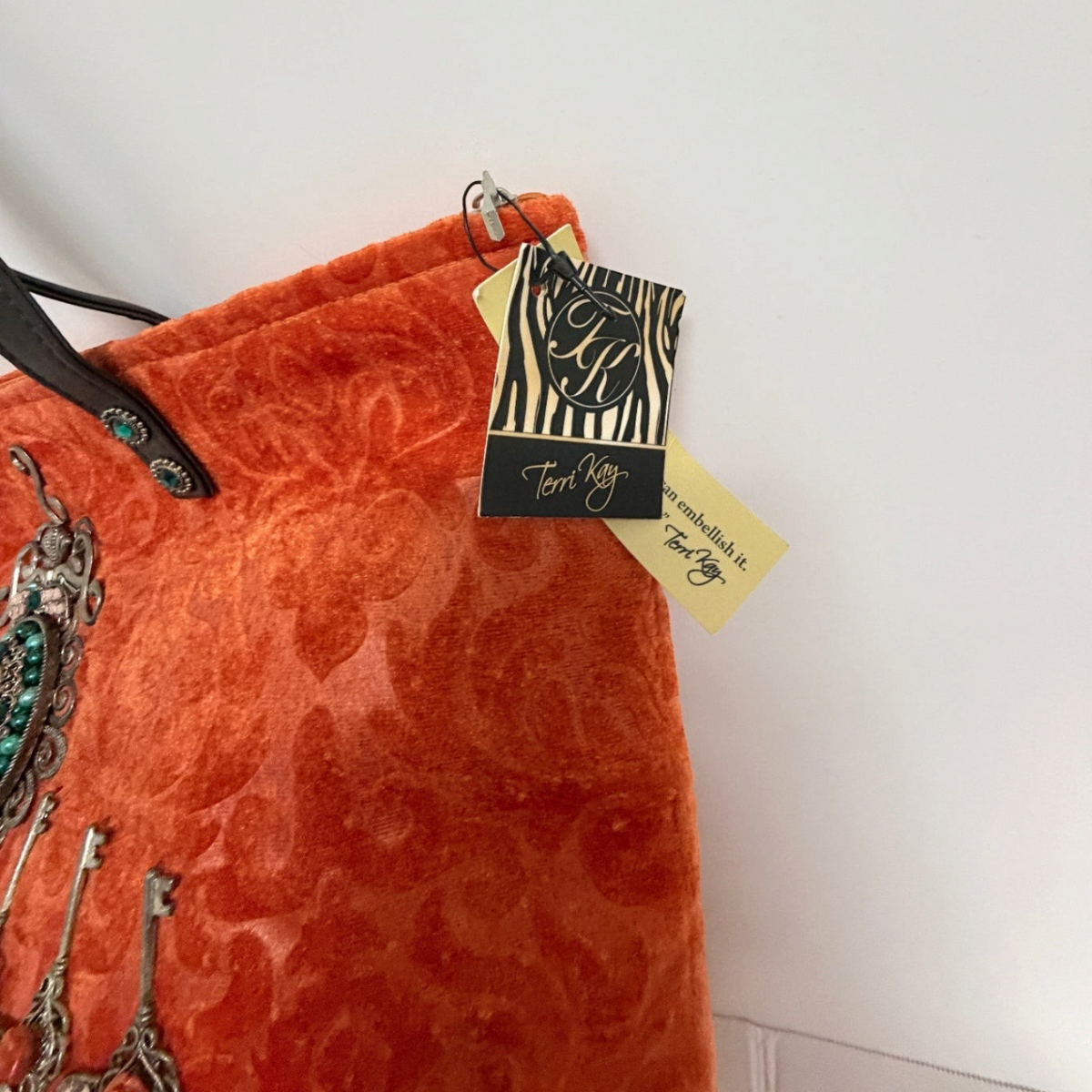 Lynn's Closet Boutique Terri Kay orange velvet tote with embossed damask pattern and jewelry-inspired embellishments