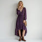 Lynn's Closet Boutique Parker abstract print midi dress with long sleeves, v-neck, and high-low hem on a blonde model