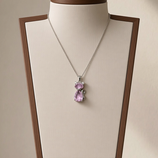 Lynn's Closet Boutique cat pendant necklace featuring a blush pink zirconia stone on a sterling silver bail and chain.