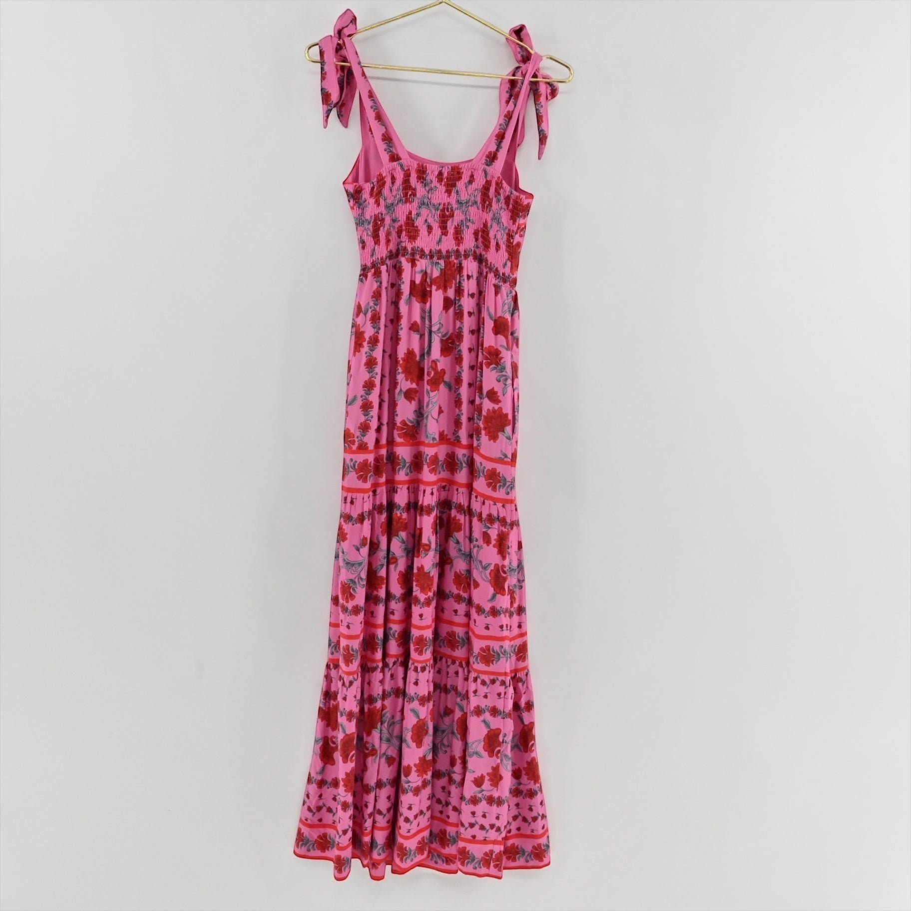 Lynn's Closet Boutique Beach Riot pink floral maxi dress with square neckline, tie straps, and smocked back bodice.