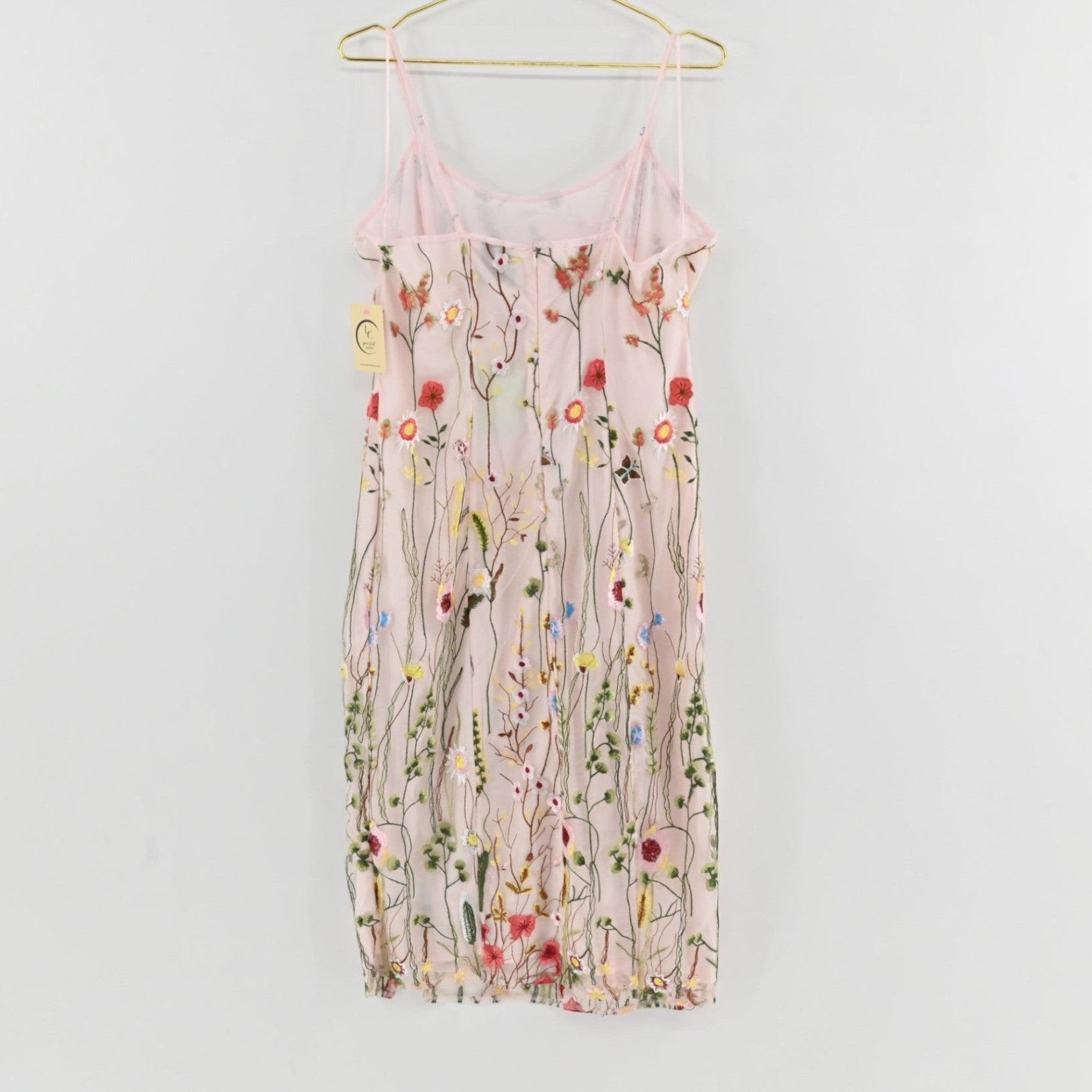 Lynn's Closet Boutique Sam Edelman pink midi dress with colorful floral embroidery, spaghetti straps, and side slit.