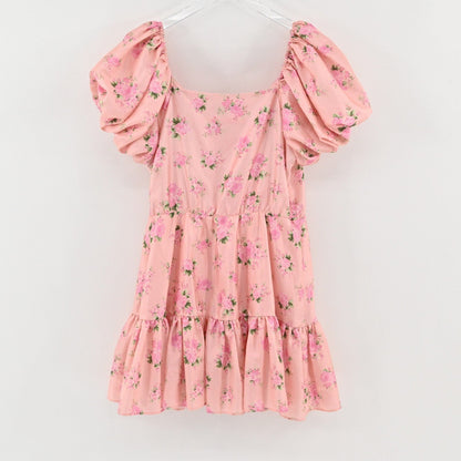 Lynn's Closet Boutique pink floral mini dress with puff sleeves, square neckline, and tiered ruffled skirt.