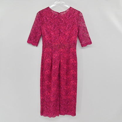 Lynn's Closet Boutique Monique Lhuillier fuchsia pink floral lace sheath dress with elbow-length sleeves, back view.