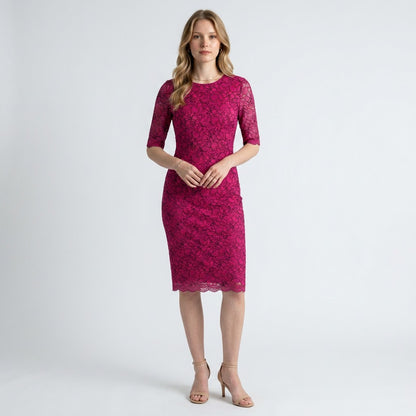 Model wearing a Lynn's Closet Boutique Monique Lhuillier pink lace sheath dress with elbow-length sleeves
