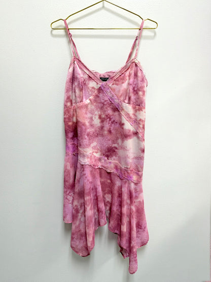 Lynn's Closet Boutique Wild Fable pink tie-dye asymmetrical dress with lace trim and spaghetti straps on a hanger