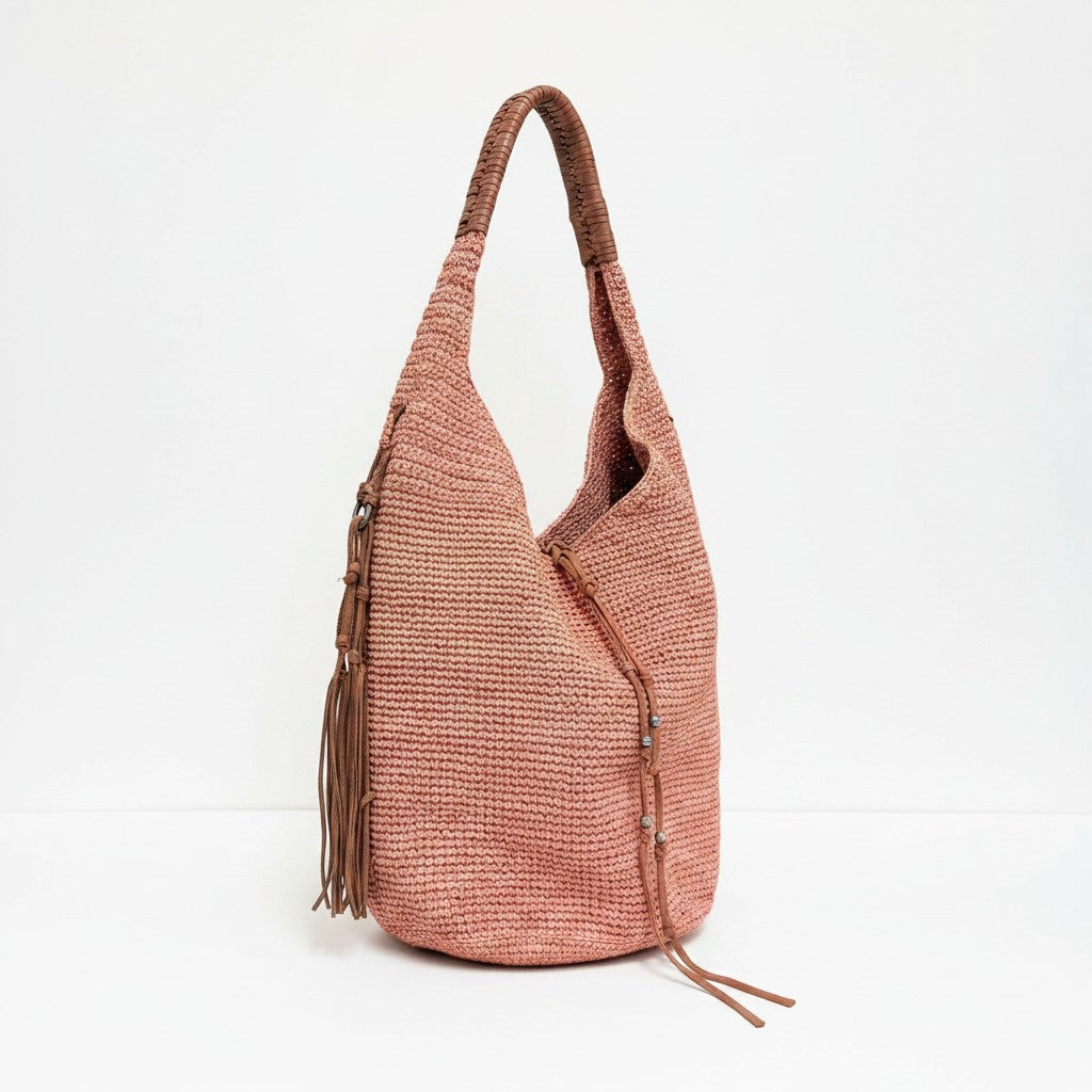 Lynn's Closet Boutique Polo Ralph Lauren coral raffia hobo bag with brown leather handle and side tassel detail