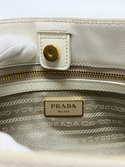 Lynn's Closet Boutique Prada Galleria handbag interior featuring gold logo plaque, zipper, and branded fabric lining.