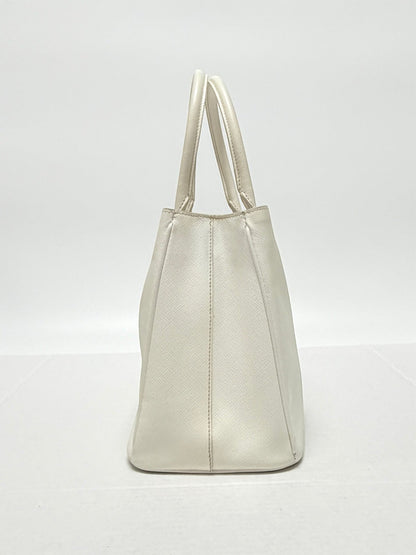 Lynn's Closet Boutique white Prada Galleria Saffiano leather handbag, side profile view showing structured design.