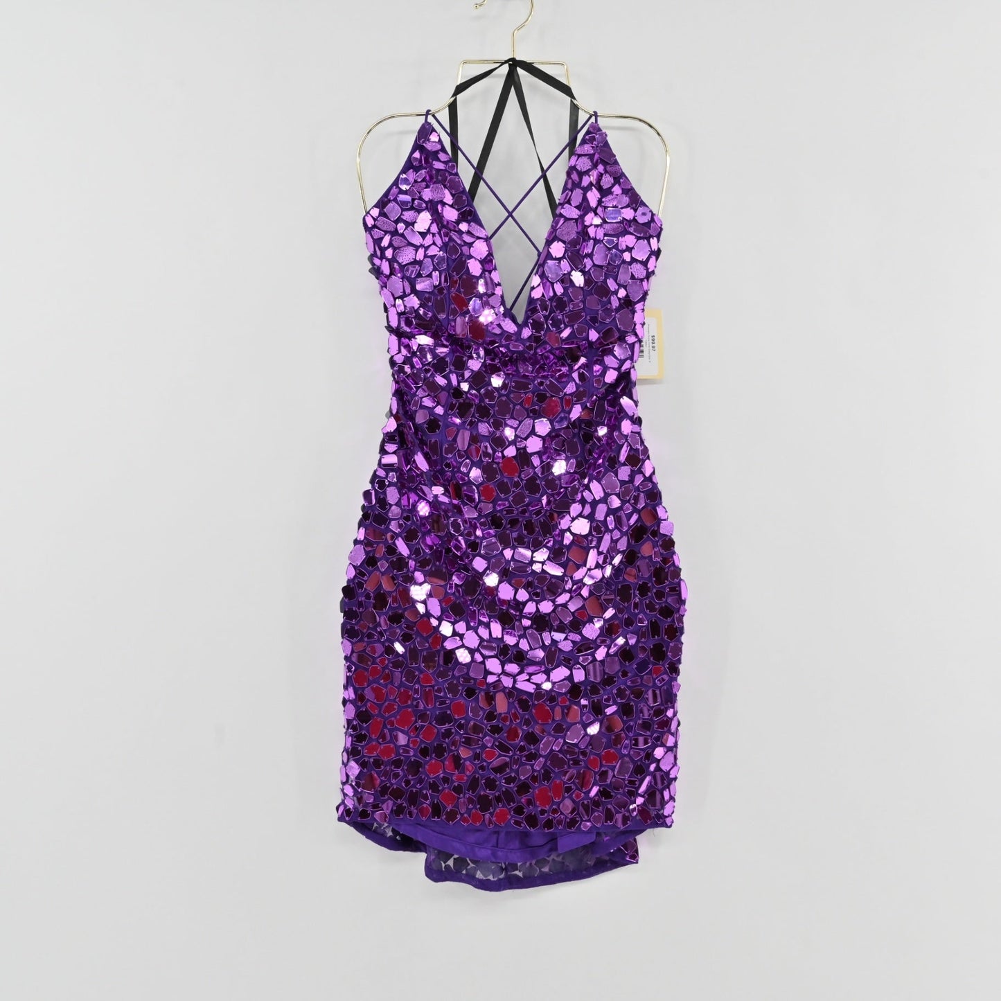Lynn's Closet Boutique purple mini dress with reflective mirror sequins, plunging neckline, and lace-up back detail.