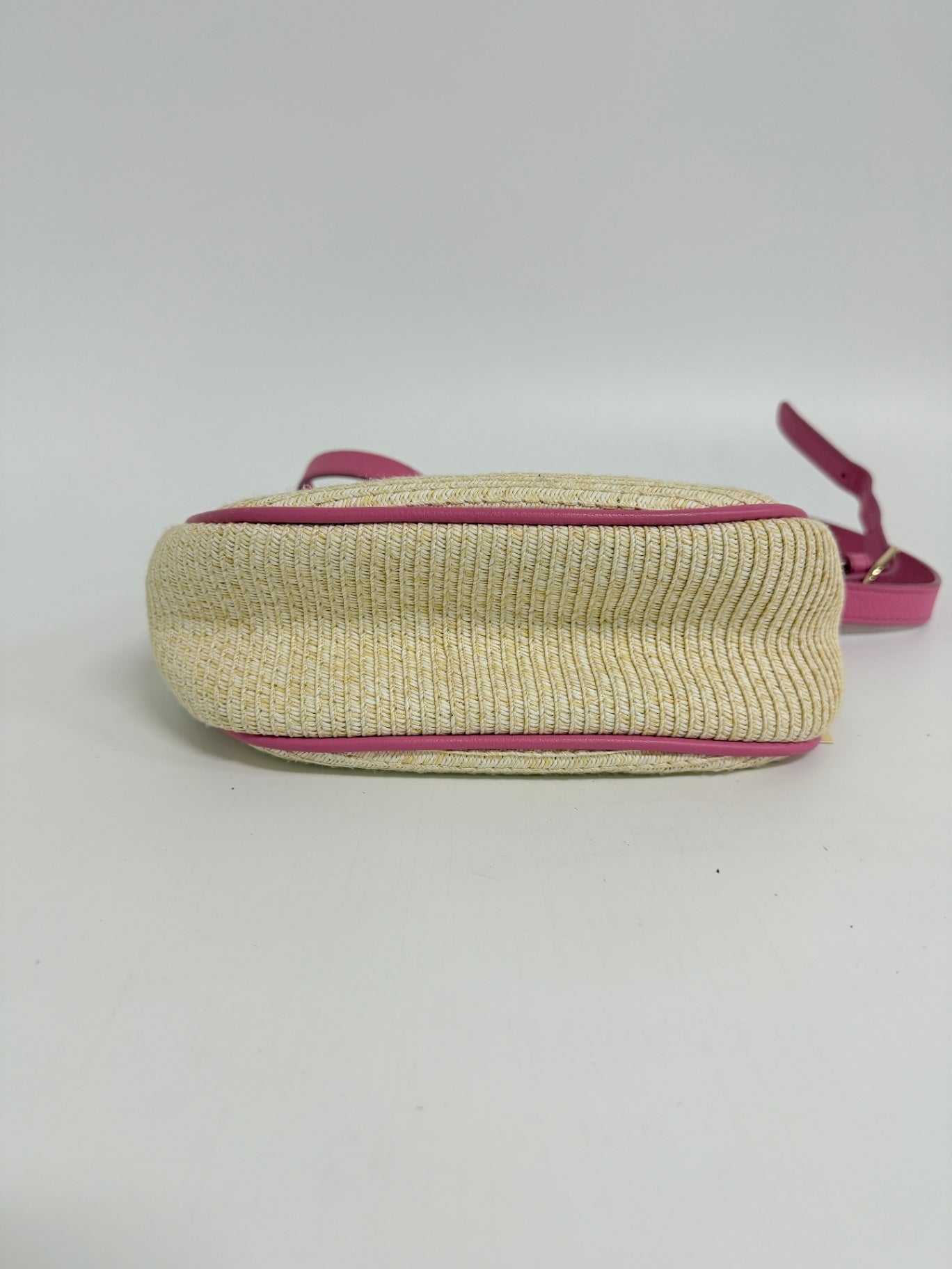 Lynn's Closet Boutique Talbots raffia crossbody bag in natural straw with vibrant pink trim, bottom view