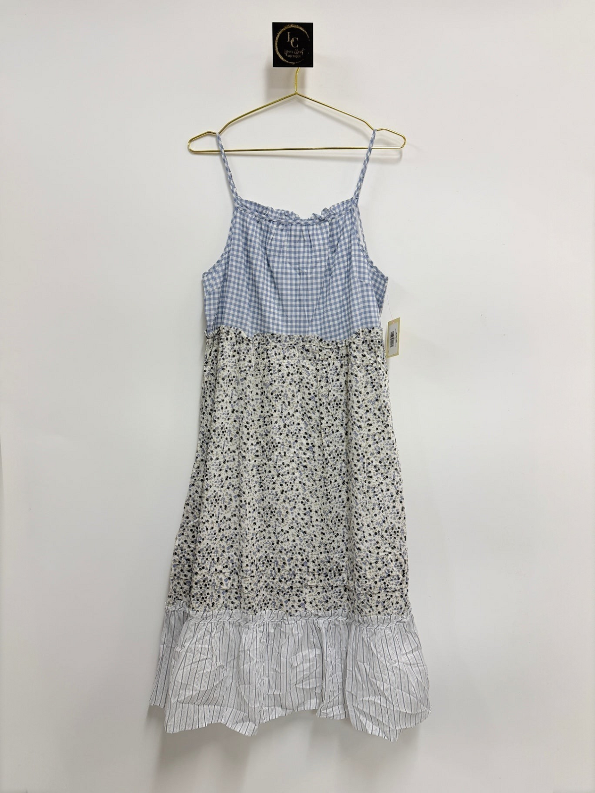 Lynn's Closet Boutique Rails Dora midi dress featuring blue gingham, floral print, and a striped ruffled hem.