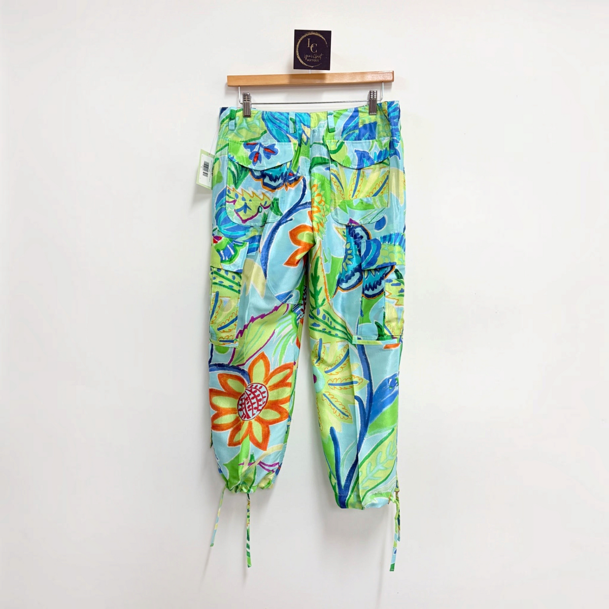 Lynn's Closet Boutique Ralph Lauren floral print silk cargo pants in light blue and green with tie-cuff hems.