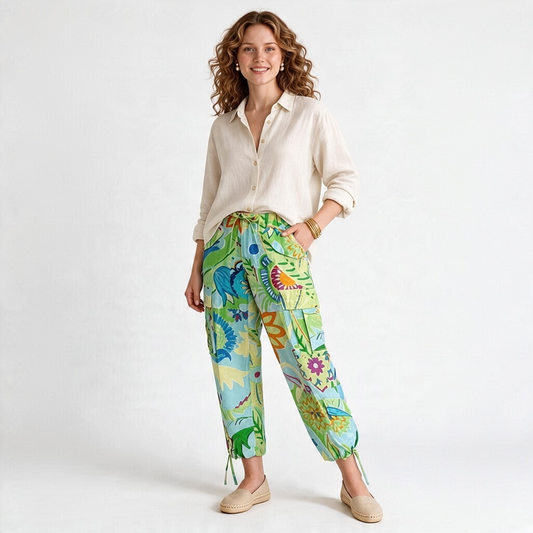 Model wearing Lynn's Closet Boutique Ralph Lauren floral silk cargo pants with drawstring waist and tie-cuff hems.