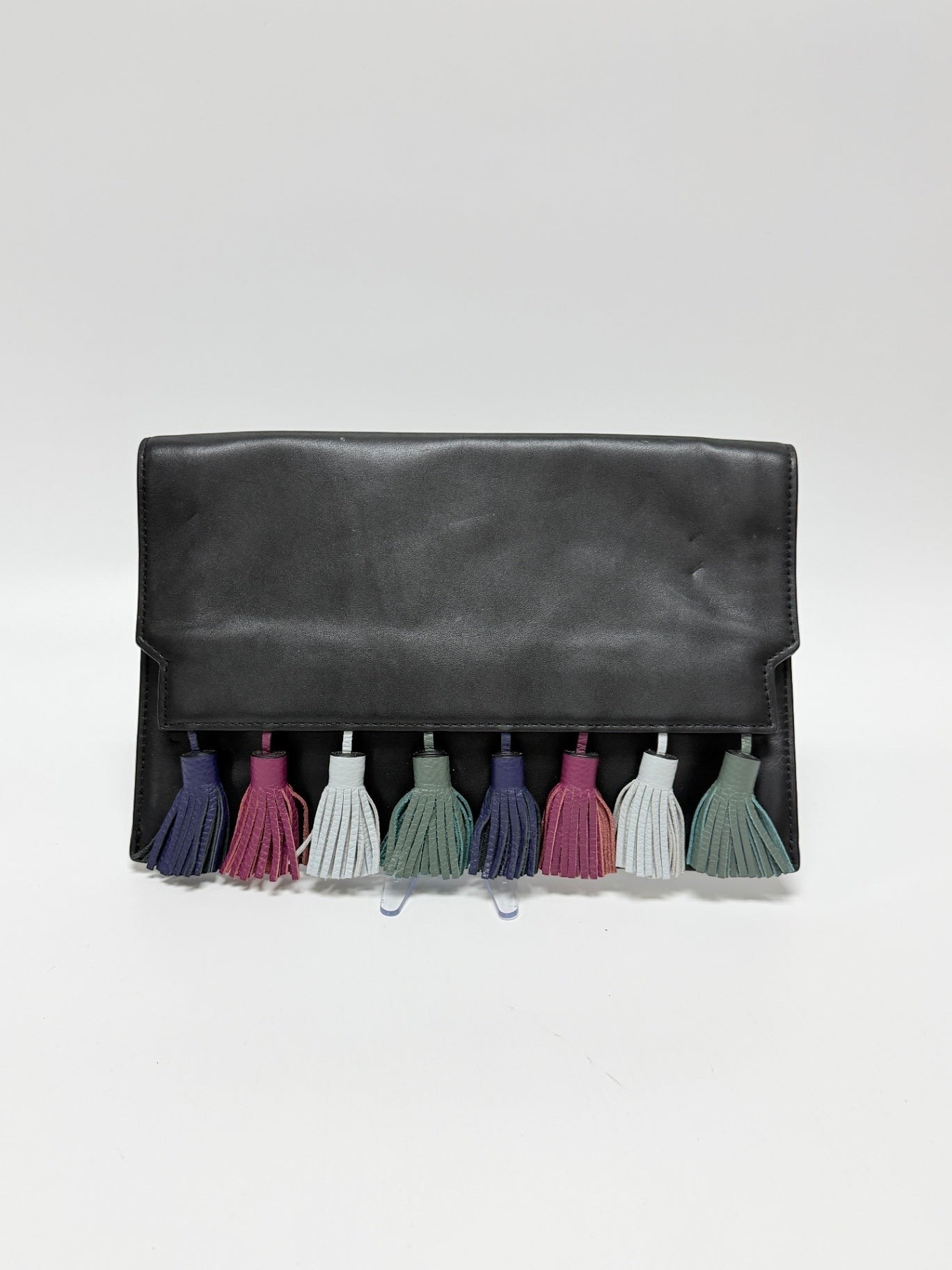 Lynn's Closet Boutique Rebecca Minkoff Sofia black leather clutch featuring a row of colorful suede tassels.