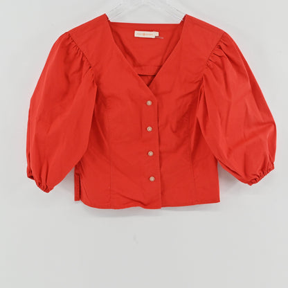 Lynn's Closet Boutique red Tory Burch cotton poplin cropped top with V-neck and dramatic puff sleeves.