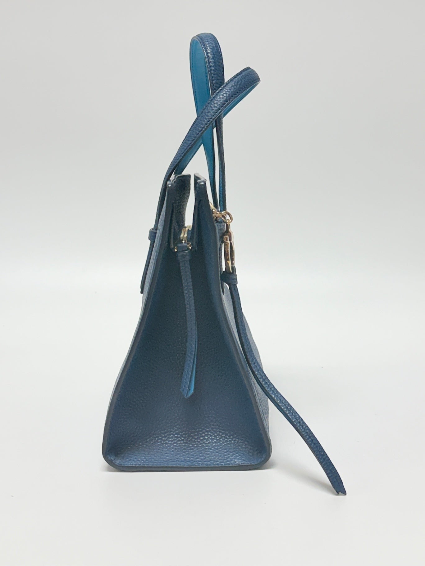 Lynn's Closet Boutique Salvatore Ferragamo Amy small blue pebbled leather tote bag, side profile view.