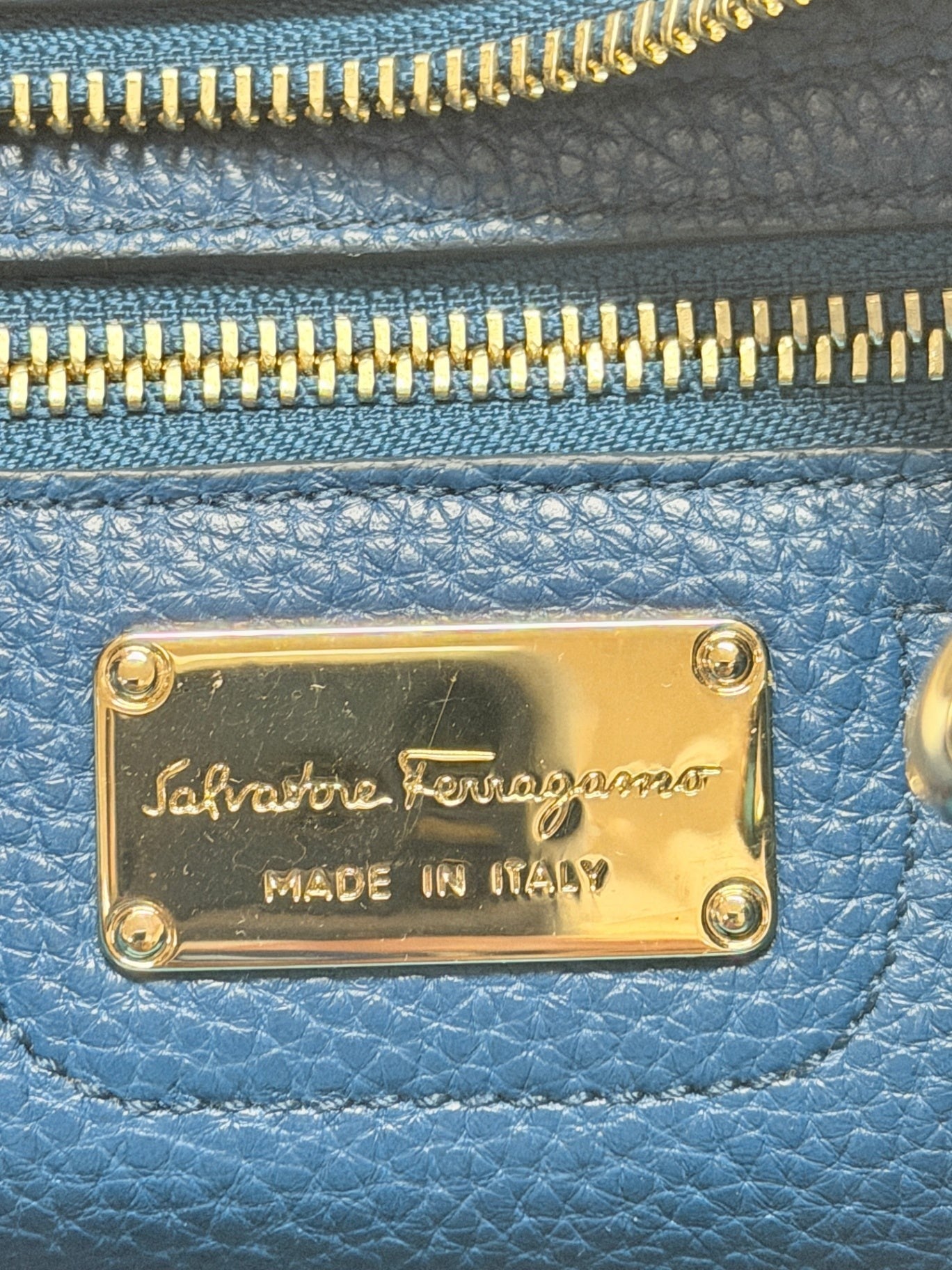 Lynn's Closet Boutique Salvatore Ferragamo gold logo plaque on blue pebbled leather tote bag interior