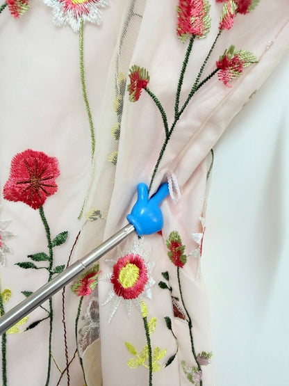 Lynn's Closet Boutique Sam Edelman dress showing detail of the pink fabric with vibrant floral embroidery and belt loop
