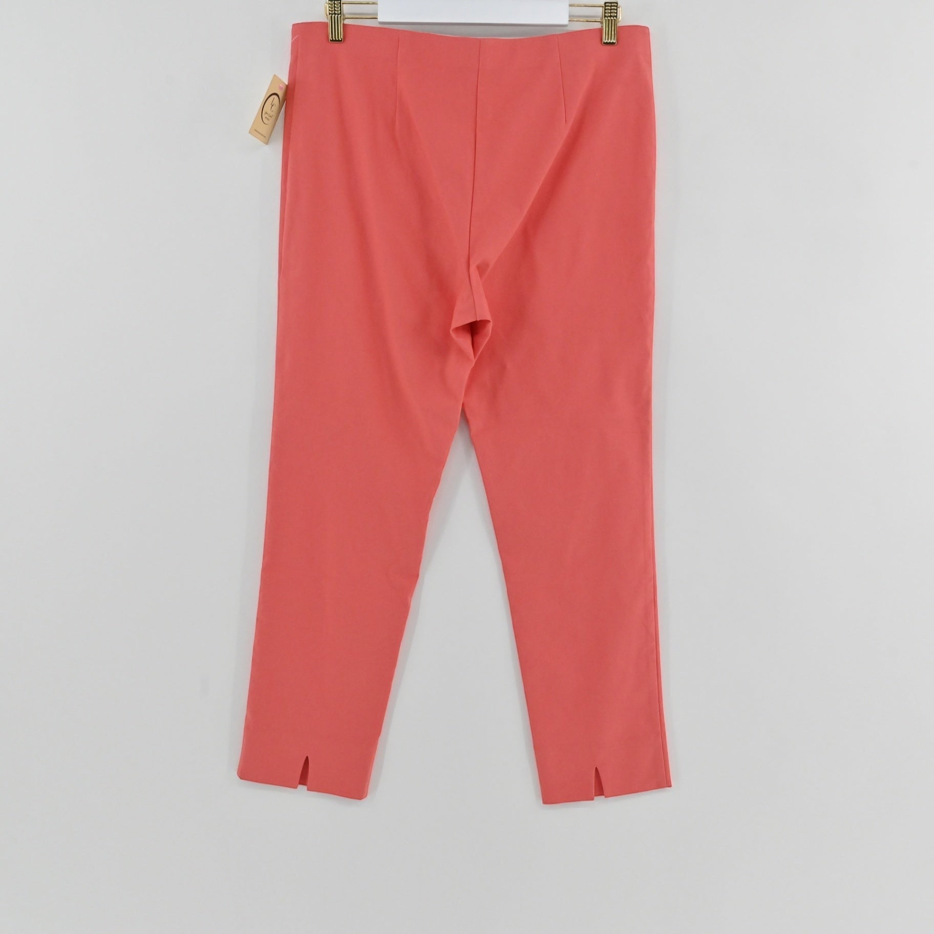 Lynn's Closet Boutique Sara Campbell coral tailored pants with a small hem slit, size XL, new with tags.