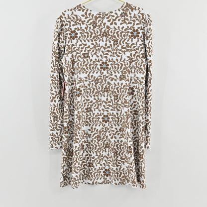 Lynn's Closet Boutique Smith Quinn white dress with brown botanical floral print and long sleeves, hanging view.
