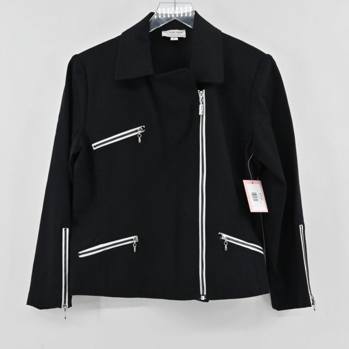 Lynn's Closet Boutique black St. John Sport moto-style jacket with white-trimmed asymmetrical zippers and collar.