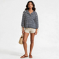 Lynn's Closet Boutique J.Crew navy and white striped snap-neck knit popover with tie-cuff sleeves on a model
