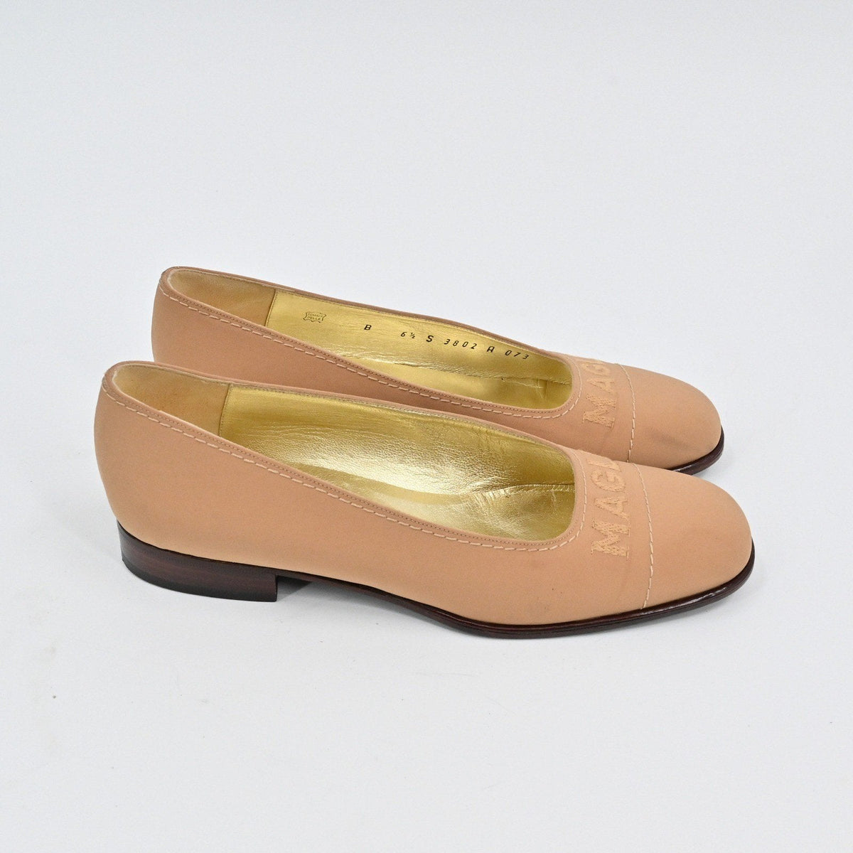 Lynn's Closet Boutique tan leather Bruno Magli loafer pumps with low heels and embossed logo detail