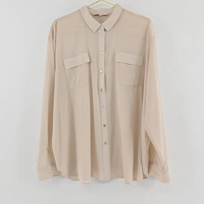 Lynn's Closet Boutique tan silk-blend button-down top with long sleeves, collar, and two chest pockets.