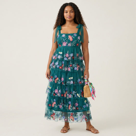 Lynn's Closet Boutique La Fuori teal floral embroidered tulle maxi dress with tie-shoulder straps on a model