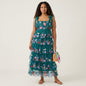 Lynn's Closet Boutique La Fuori teal floral embroidered tulle maxi dress with tie-shoulder straps on a model