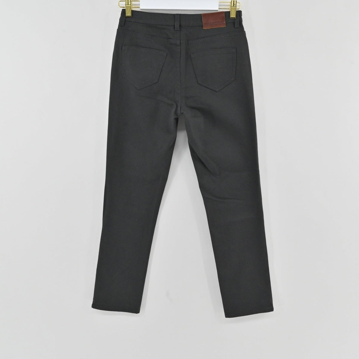 Lynn's Closet Boutique Thakoon slate grey cropped jeans featuring a back view with a leather brand patch and pockets.