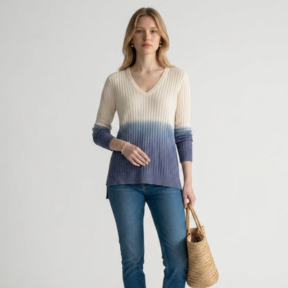 Lynn's Closet Boutique Tommy Bahama ombre alpaca sweater in cream and blue with a V-neck, worn with jeans and wedges.