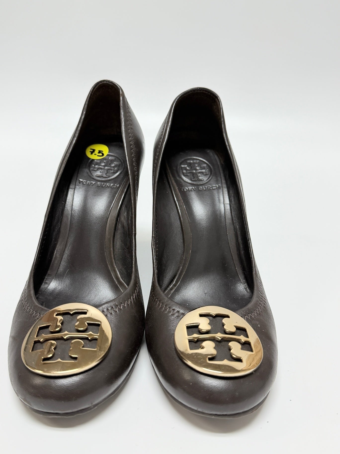 Lynn's Closet Boutique brown leather Tory Burch wedge shoes with gold-tone logo medallion, size 7.5.