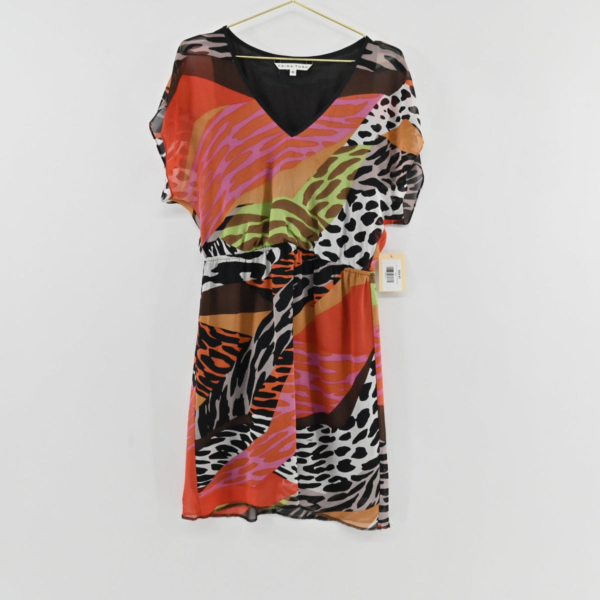 Lynn's Closet Boutique Trina Turk multi-colored animal print V-neck dress with flutter sleeves and elasticized waist.