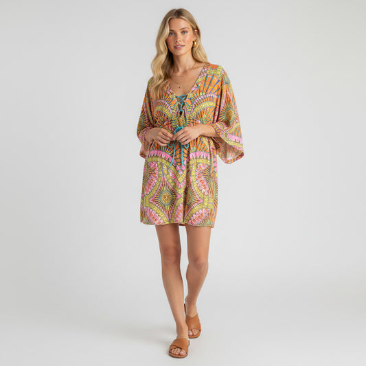 Lynn's Closet Boutique Trina Turk tunic cover-up in orange, pink, and yellow geometric print. V-neck with turquoise drawstring tie.