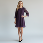 Lynn's Closet Boutique Trina Turk purple mini dress with geometric circle overlay, three-quarter sleeves, and shift fit