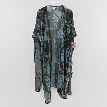 Lynn's Closet Boutique velvet burnout floral shawl in black and blue with scalloped lace trim hanging on a hanger.