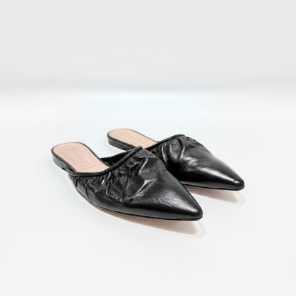 Lynn's Closet Boutique Vicenza black leather mules with a pointed toe and ruched detailing on a white background.