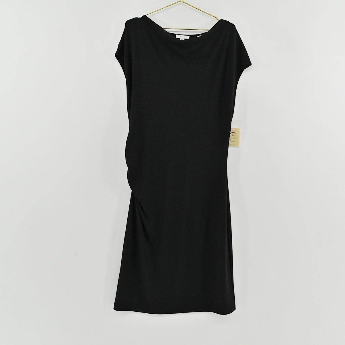 Lynn's Closet Boutique Vince black cowl neck dress with cap sleeves and side ruching hanging on a gold hanger