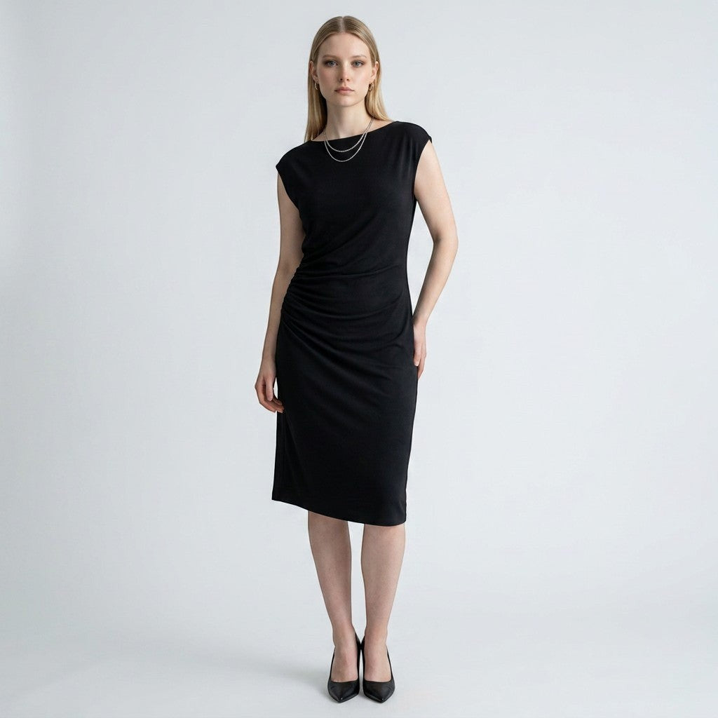 Model wearing a Lynn's Closet Boutique black Vince cowl neck dress with side ruching and cap sleeves
