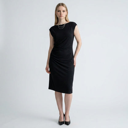 Model wearing a Lynn's Closet Boutique black Vince cowl neck dress with side ruching and cap sleeves
