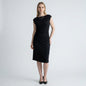 Model wearing a Lynn's Closet Boutique black Vince cowl neck dress with side ruching and cap sleeves