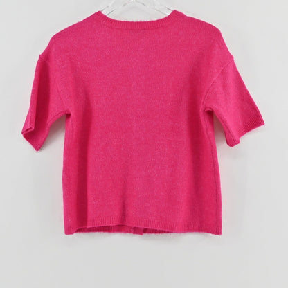Lynn's Closet Boutique hot pink Vince Camuto short sleeve knit cardigan with a crew neckline, back view.