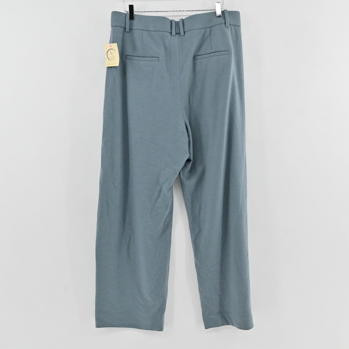 Lynn's Closet Boutique Vince blue-grey wide-leg trousers with back welt pockets and belt loops, hanging view.