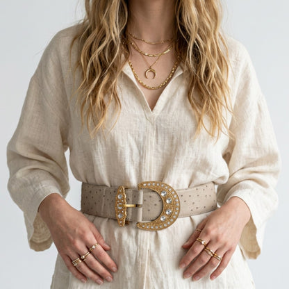 Lynn's Closet Boutique vintage ostrich leather belt in beige with a large rhinestone-embellished crescent buckle.